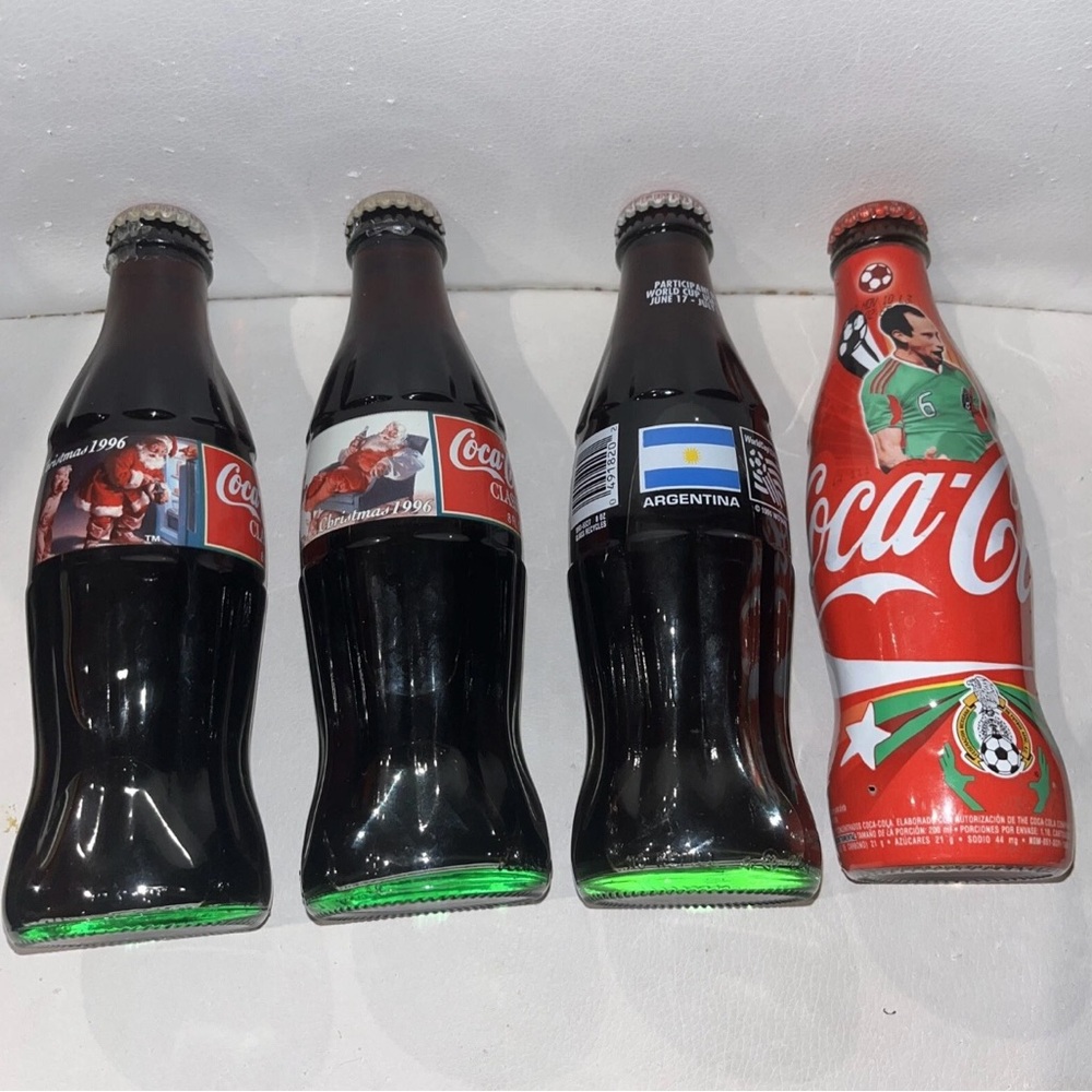 4 Unopened Bottles 2 Christmas 1996 Coca-Cola  Coke 1 Argentina 1 Mexico vtg